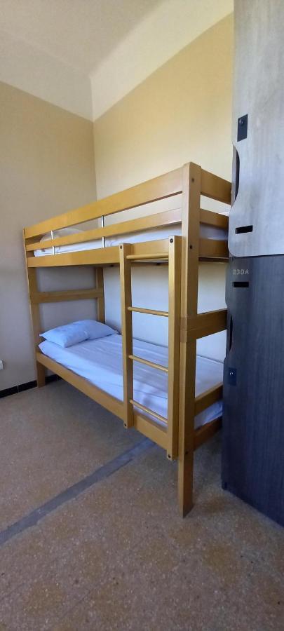 Room with 2 Bunk Beds – Shared Bathroom