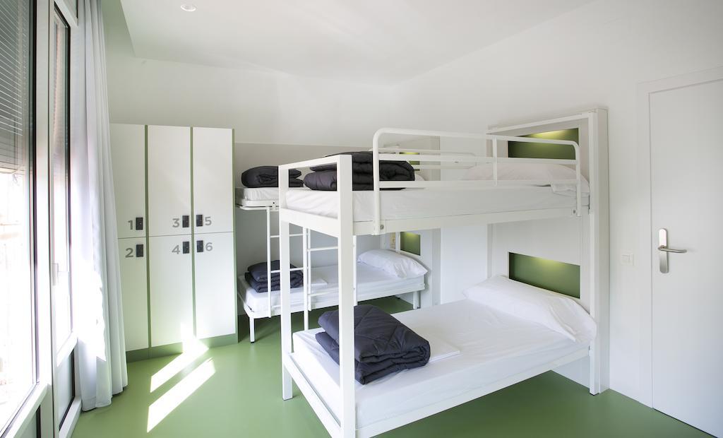 Cama en habitación compartida de 6 camas