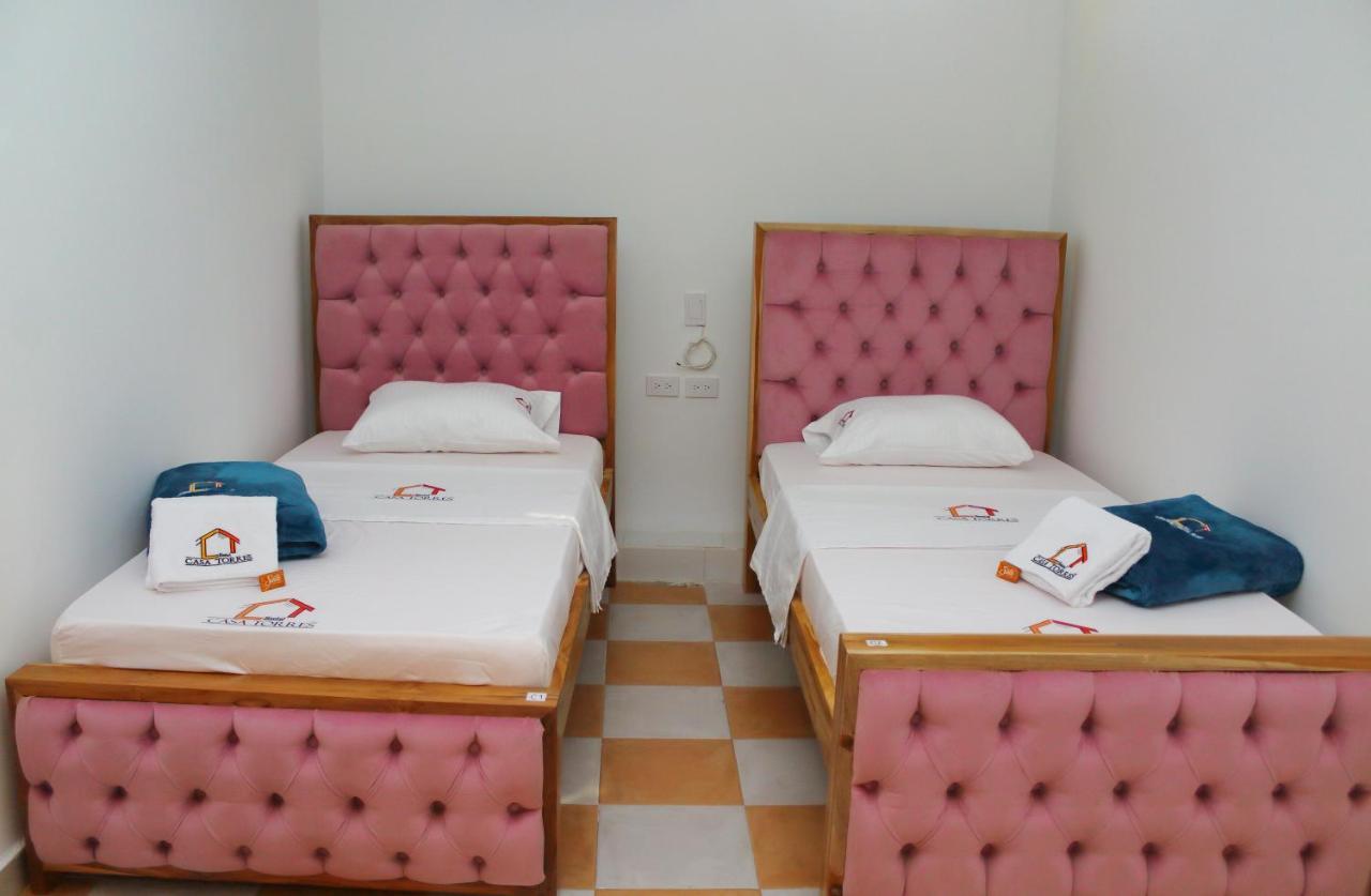 Cama Individual en habitación compartida femenina