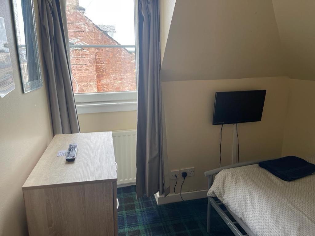 Single Room with Shared Shower and Toilet
