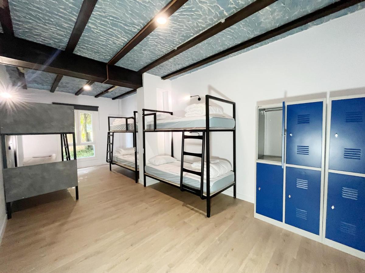 Cama en habitación compartida mixta de 8 camas