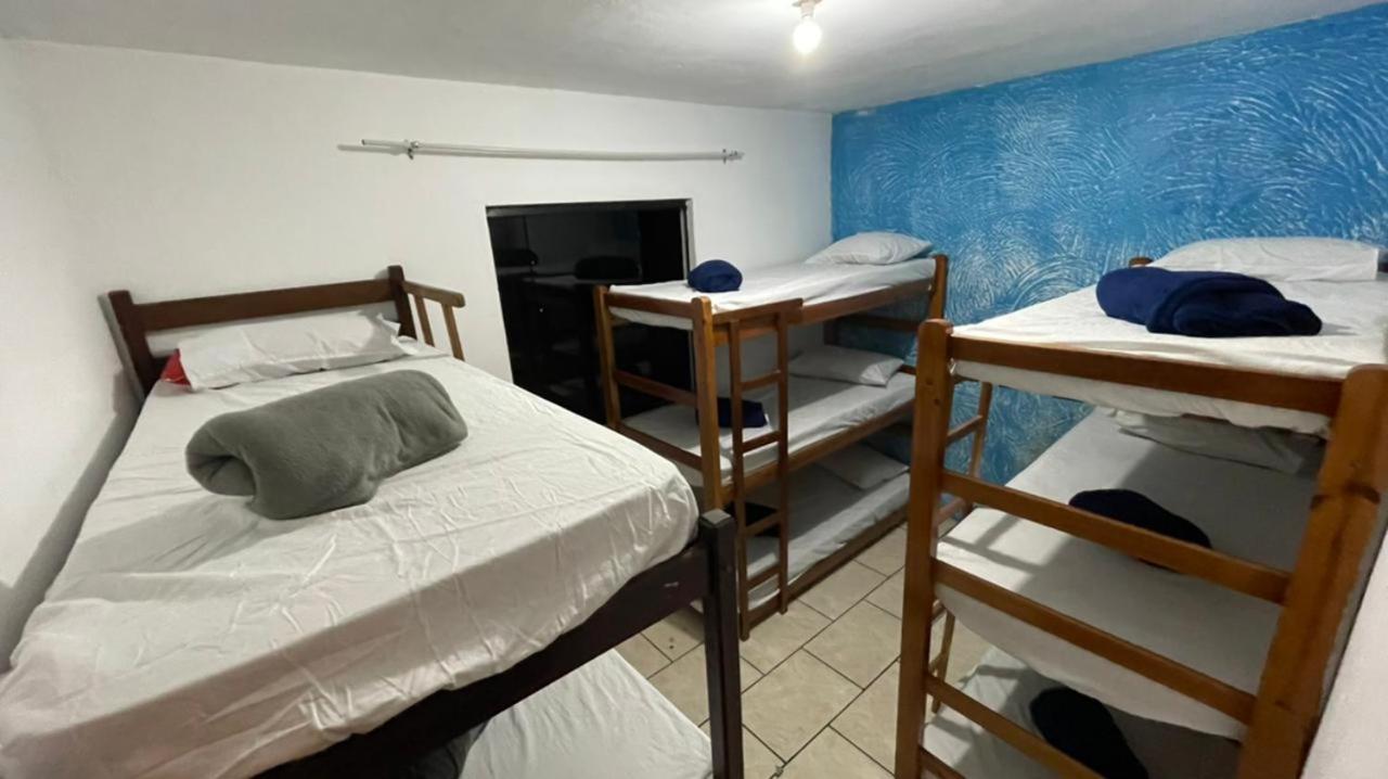 Cama individual en habitación compartida