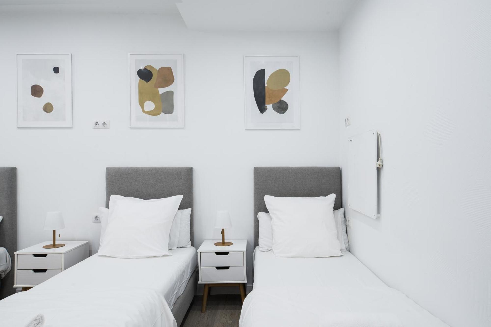 Camera Quadrupla con Bagno in Comune