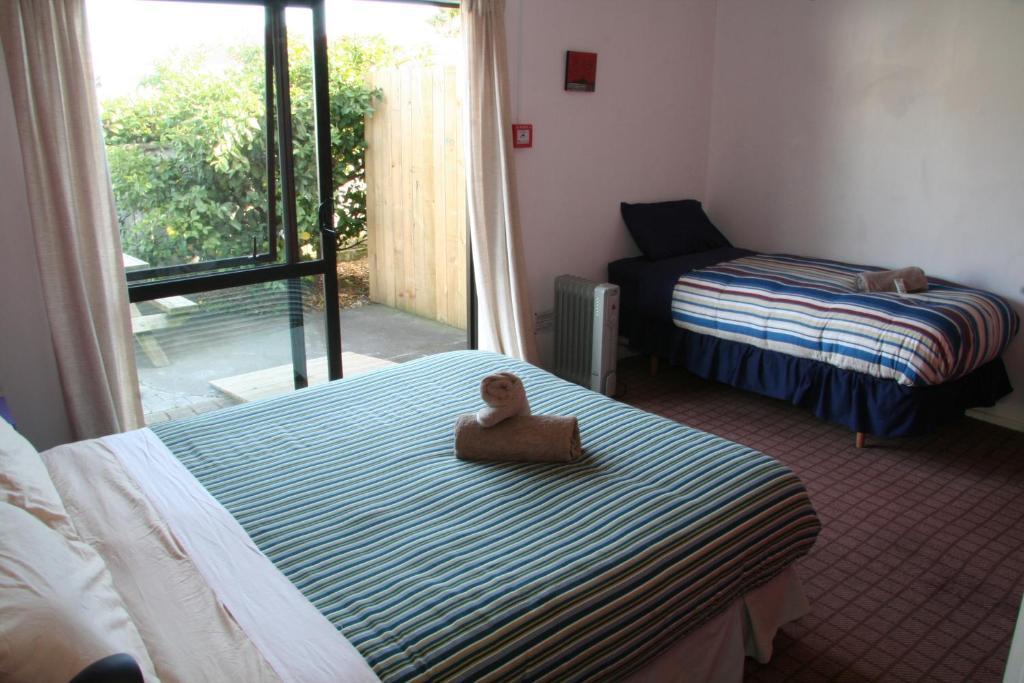 Kamer met Queensize Bed en Eigen Badkamer