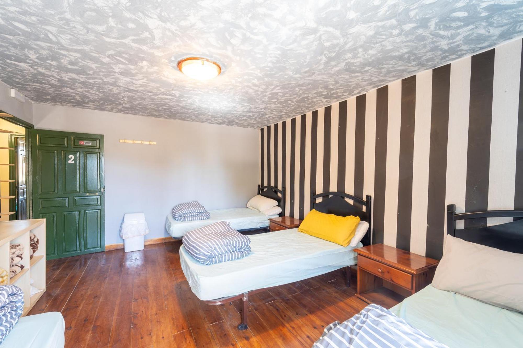 Single Bed 4-Bed Dormitory Room
