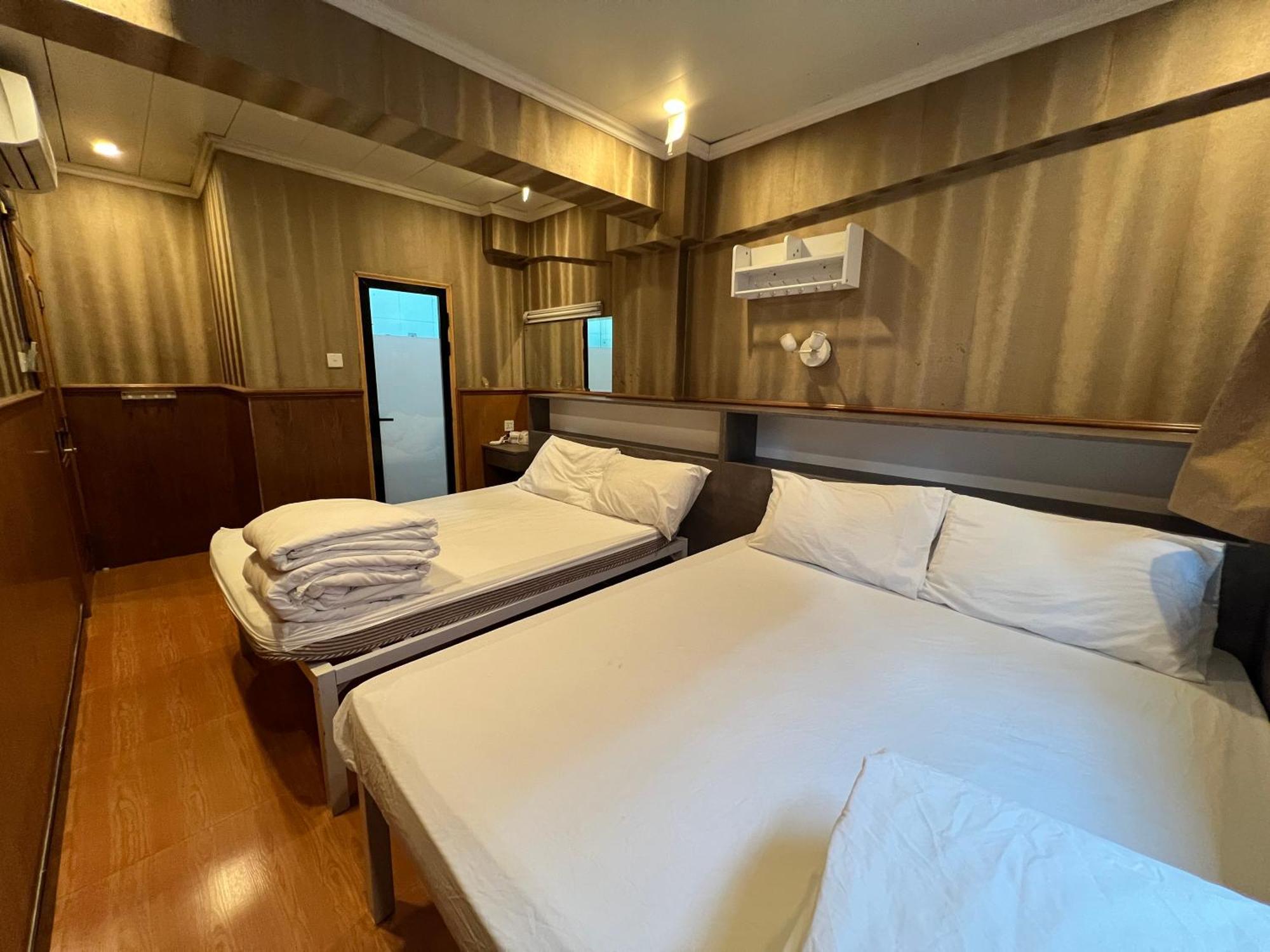 Quadruple Room with Private Bathroom