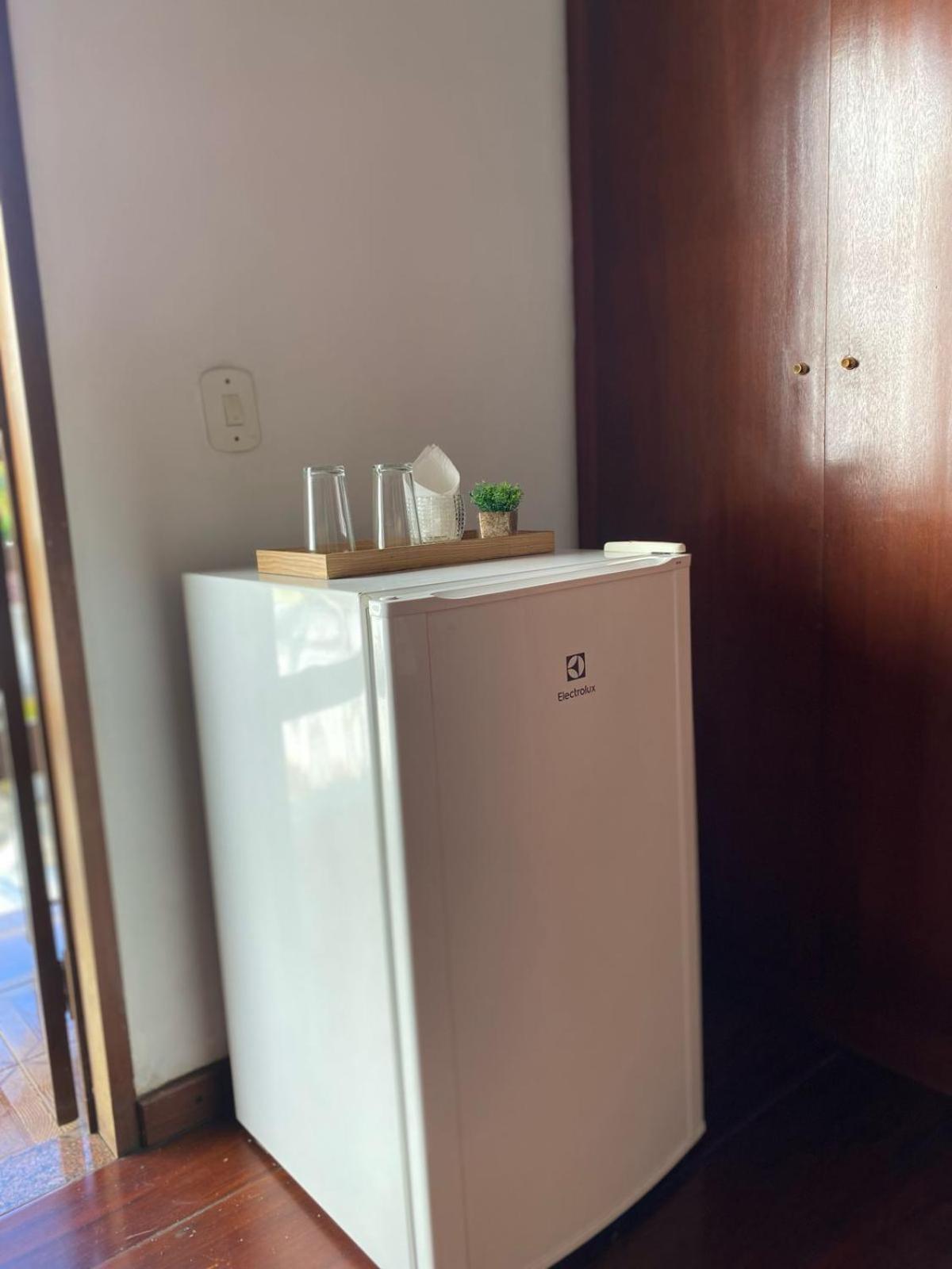 Suite com Cama King-size e Vista Piscina
