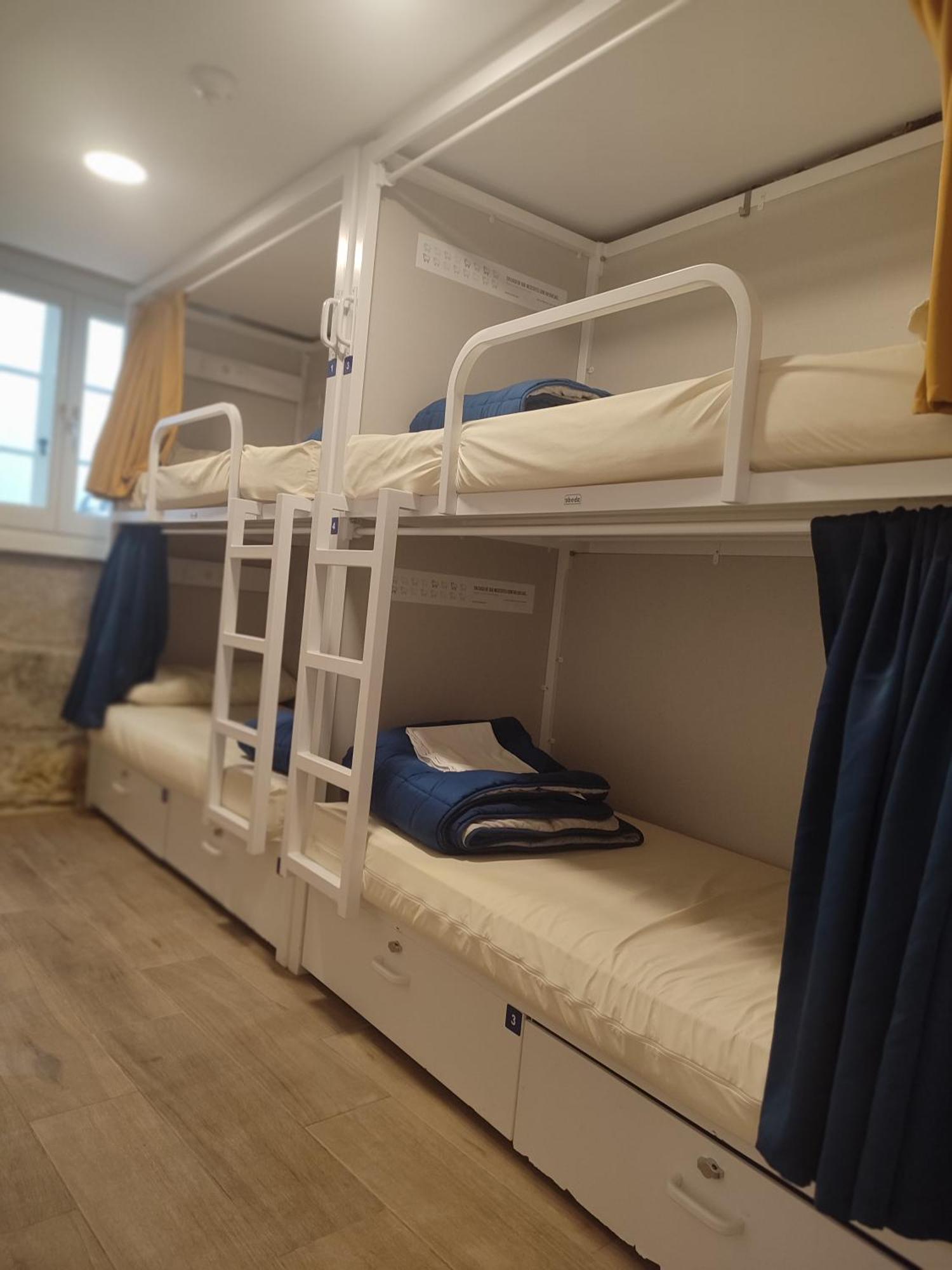 Posto Letto in Dormitorio con 4 Letti