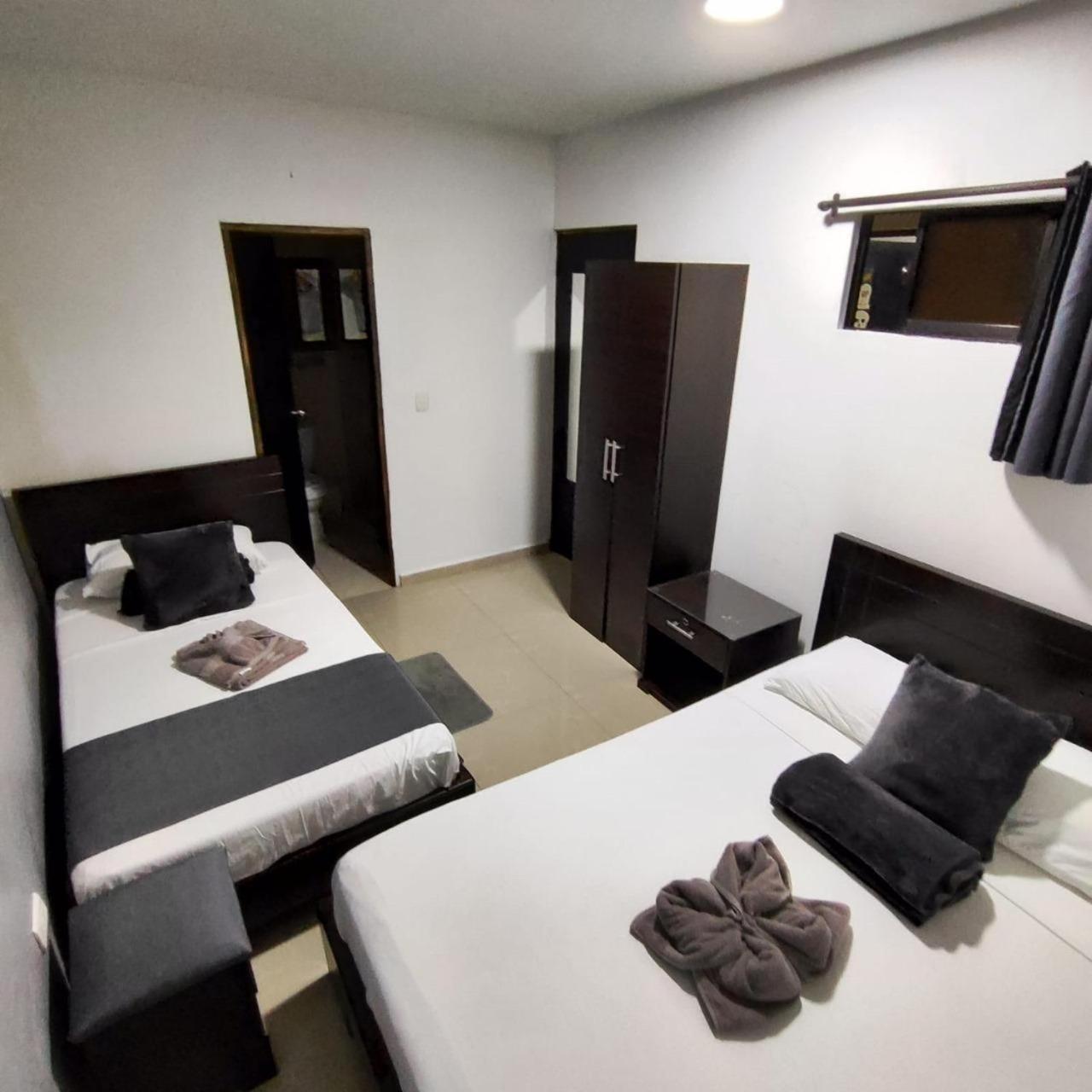 Chambre Triple avec Salle de Bains Privative