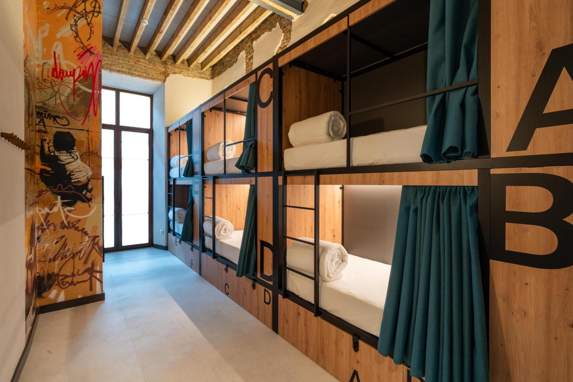 Cama en habitación compartida mixta de 10 camas