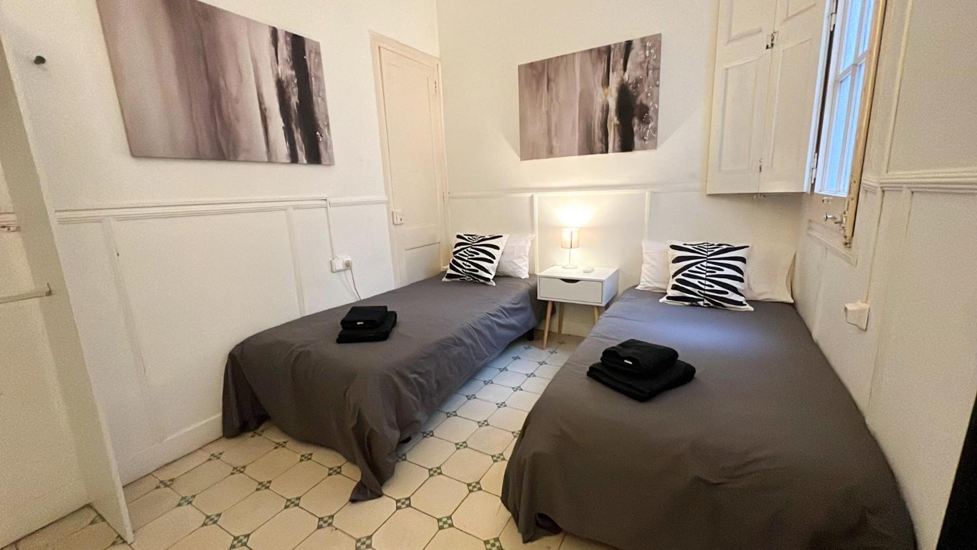 Camera Superior Doppia con Letti Singoli con Bagno in Comune