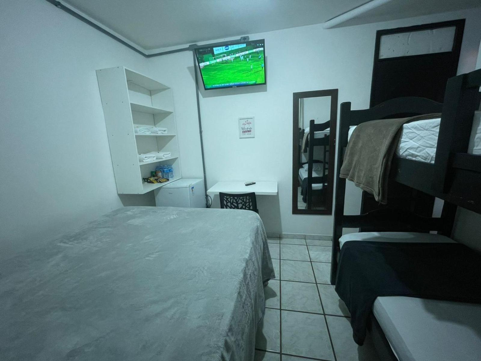Quarto Quádruplo Premium