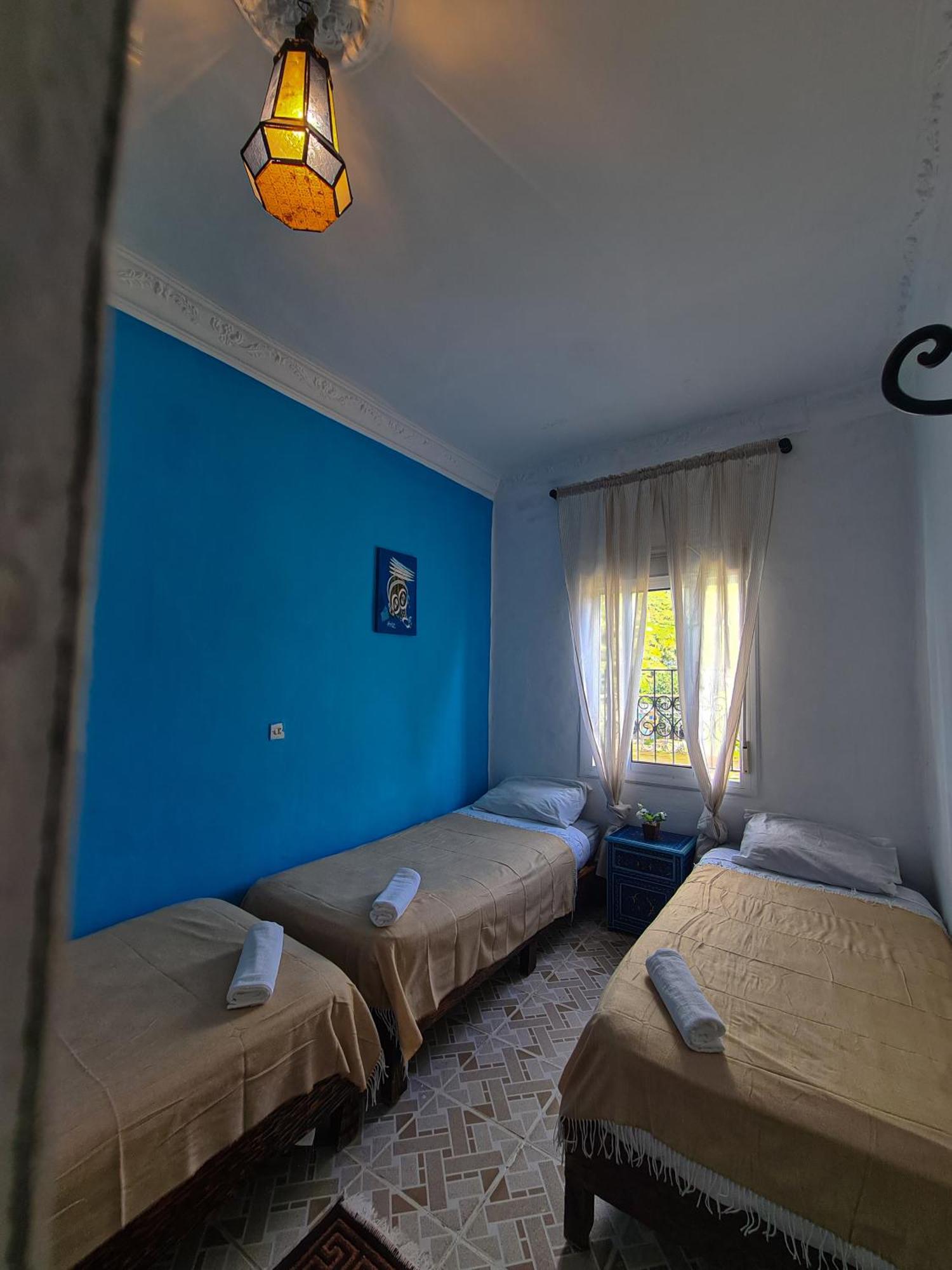 Camera Tripla con Bagno in Comune