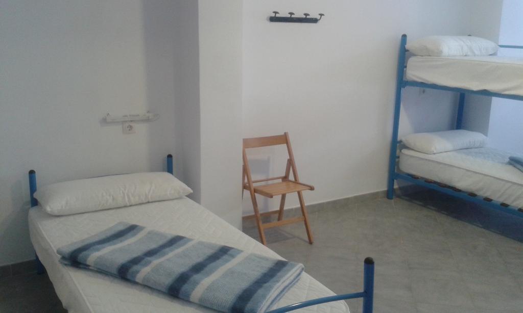 Single Bed in Dormitory Room
