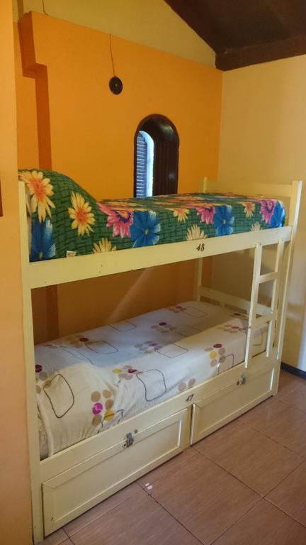 Cama individual en habitación compartida mixta