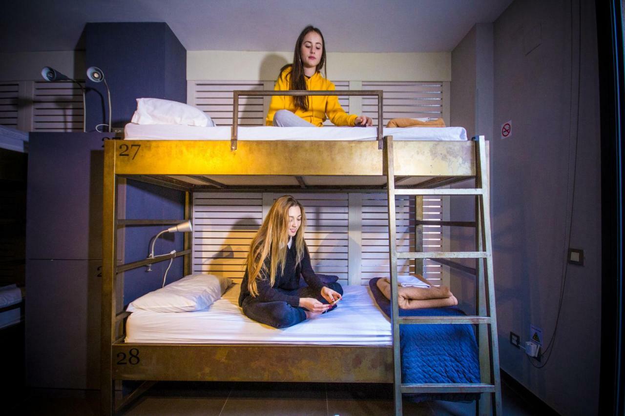 Single bed in 16-Bed Men Dormitory Room