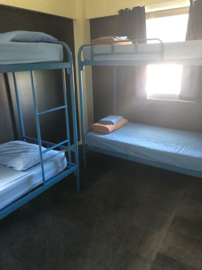 Bed in 4 bed mixed dormitory room with Shared Bathroom