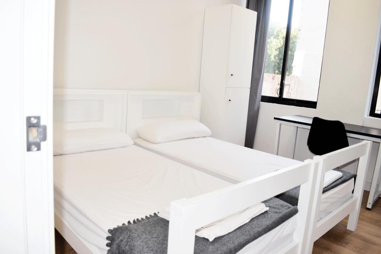 Habitación Doble con baño privado externo - 2 camas