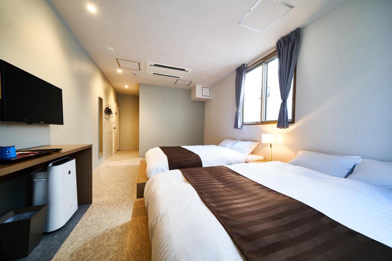 Quadruple Room with Private Bathroom